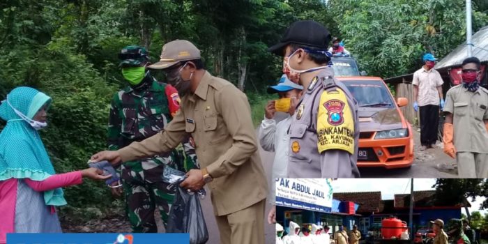 Kades Kayumas Lawan Covid -19, Gencar Lakukan Kegiatan Penyemprotan Dan Bagi-Bagi Masker