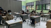 9 Siswa Terpapar COVID-19, SMP Negeri 22 Gresik Hentikan PTM