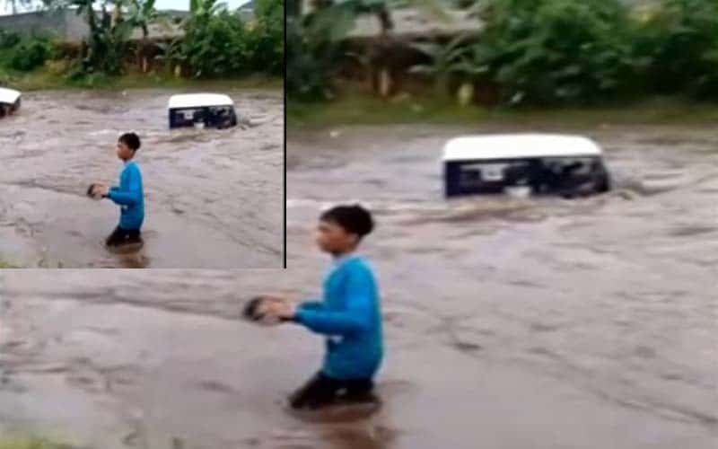 Setelah mengerahkan sejumlah kendaraan off road lainnya, salah satu mobil naas ini berhasil dinaikkan dari tengah arus banjir. Sedangkan satu kendaraan lainnya, masih menunggu arus banjir surut.